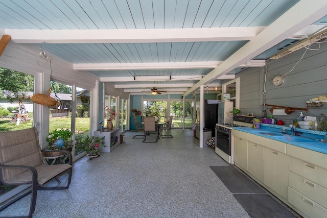 2940 Felstet Ln, Redding, CA 96001 - view of patio featuring ceiling fan, outdoor dining space, and an outdoor kitchen