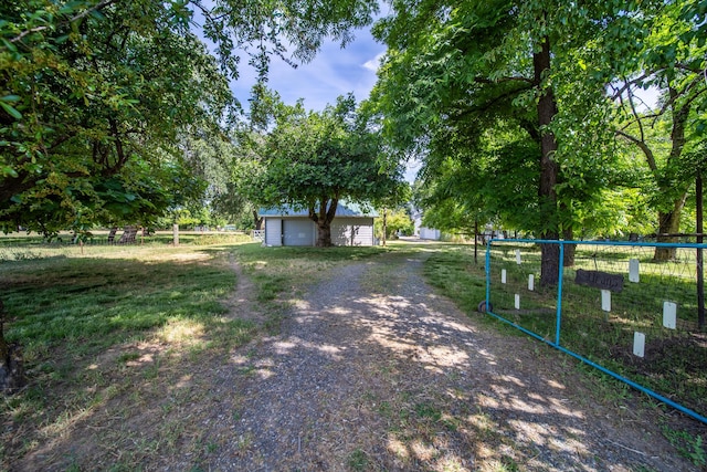 2940 Felstet Ln, Redding, CA 96001 - view of dirt / gravel road featuring a gated entry