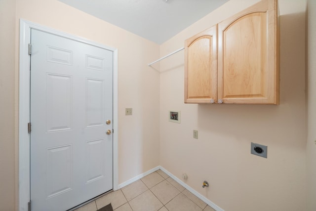 1626 French Lace Ln, Redding, CA 96003 - laundry room with hookup for an electric dryer, hookup for a washing machine, baseboards, gas dryer hookup, and light tile patterned floors