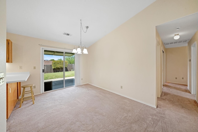 1626 French Lace Ln, Redding, CA 96003 - unfurnished dining area with light carpet, a chandelier, and baseboards