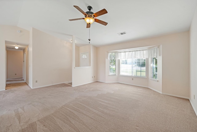 1626 French Lace Ln, Redding, CA 96003 - empty room with a ceiling fan, light carpet, baseboards, and vaulted ceiling