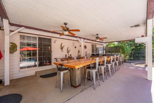 15947 Butterfield Ln, Anderson, CA 96007 - view of patio / terrace with ceiling fan and exterior bar