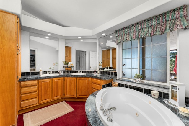 15947 Butterfield Ln, Anderson, CA 96007 - full bathroom featuring recessed lighting, a jetted tub, and vanity