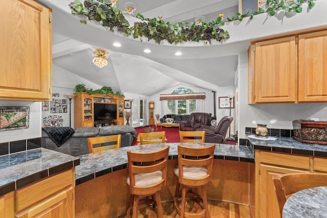 15947 Butterfield Ln, Anderson, CA 96007 - kitchen featuring lofted ceiling, wood finished floors, open floor plan, recessed lighting, and light brown cabinetry