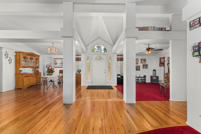 15947 Butterfield Ln, Anderson, CA 96007 - foyer entrance featuring light wood-type flooring, a chandelier, lofted ceiling, and a ceiling fan