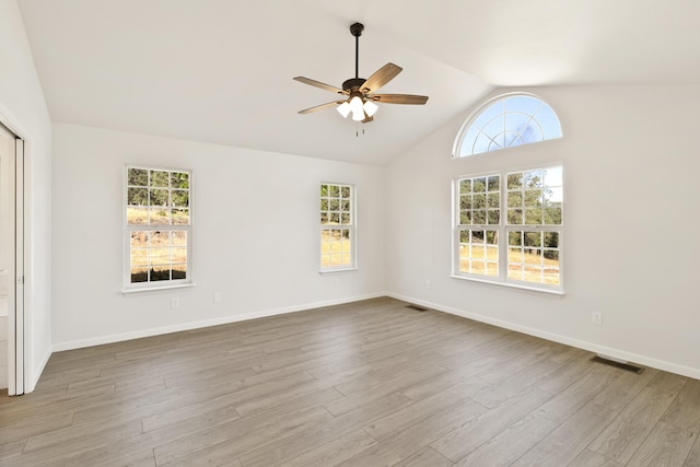 13360 Oak Run Rd, Oak Run, CA 96069 - unfurnished room with a ceiling fan, vaulted ceiling, wood finished floors, and baseboards
