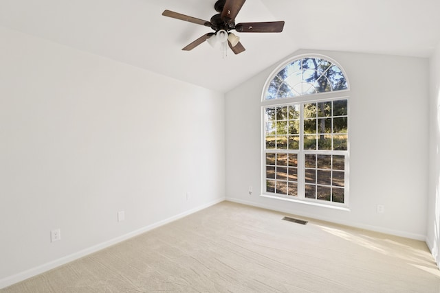 13360 Oak Run Rd, Oak Run, CA 96069 - spare room featuring lofted ceiling, light colored carpet, ceiling fan, and baseboards