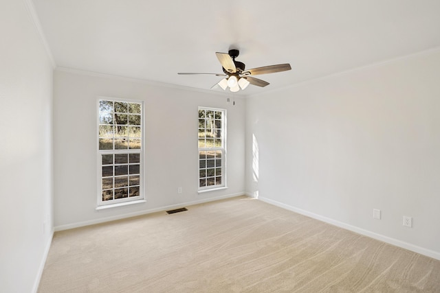 13360 Oak Run Rd, Oak Run, CA 96069 - spare room with ornamental molding, baseboards, a ceiling fan, and light carpet