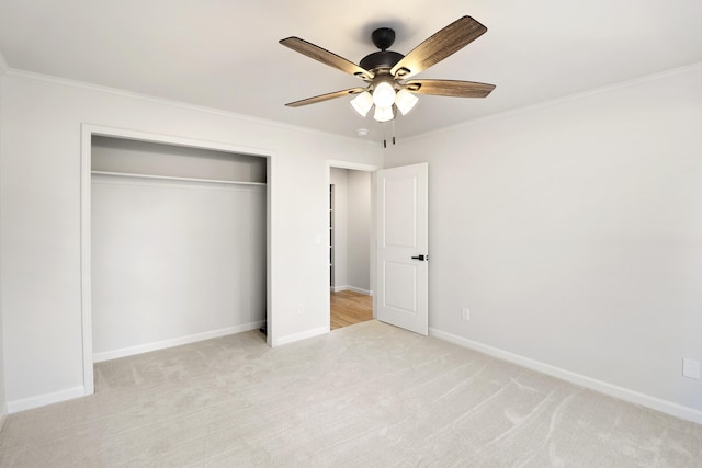 13360 Oak Run Rd, Oak Run, CA 96069 - unfurnished bedroom with a closet, ornamental molding, light colored carpet, baseboards, and a ceiling fan