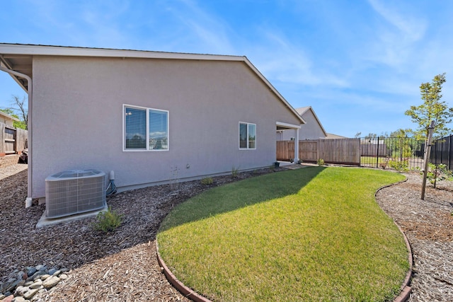 2764 Austere Ave, Redding, CA 96003 - back of house with central air condition unit and stucco siding