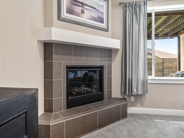 2830 Calaveras Ct, Redding, CA 96002 - detailed view of a tiled fireplace, carpet floors, and baseboards