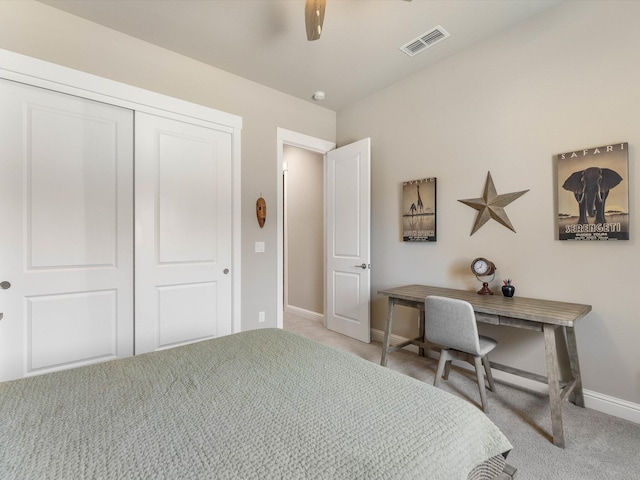2830 Calaveras Ct, Redding, CA 96002 - bedroom with light carpet, baseboards, a closet, and a ceiling fan