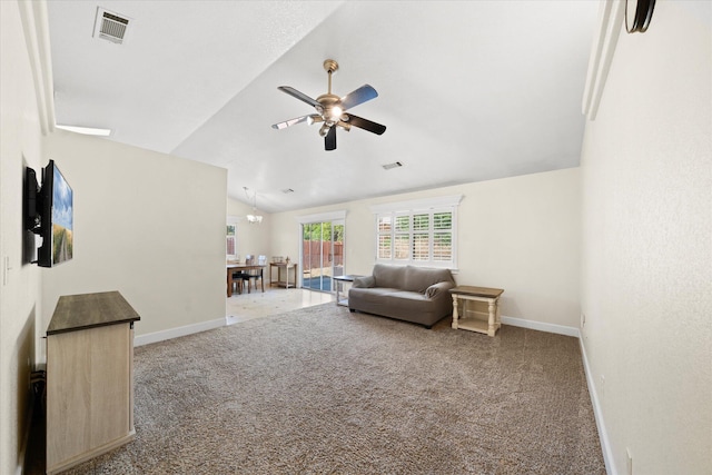 853 Paramount Way, Redding, CA 96003 - carpeted living area with ceiling fan, vaulted ceiling, and baseboards