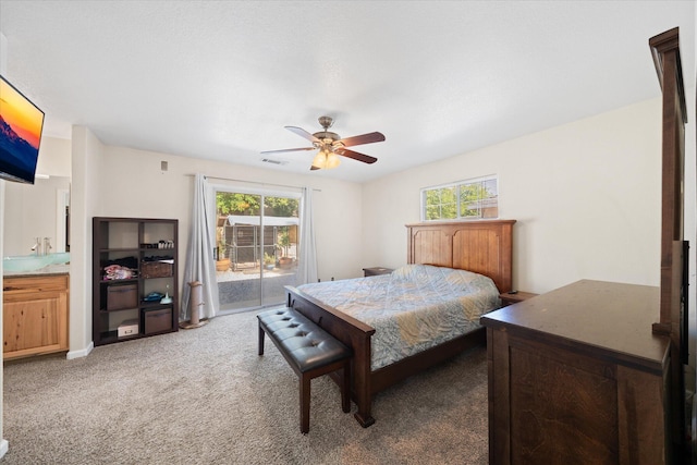 853 Paramount Way, Redding, CA 96003 - bedroom featuring access to exterior, light colored carpet, and a ceiling fan