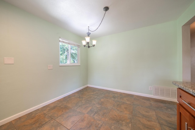 5101 Bidwell Rd, Redding, CA 96001 - empty room featuring a chandelier and baseboards