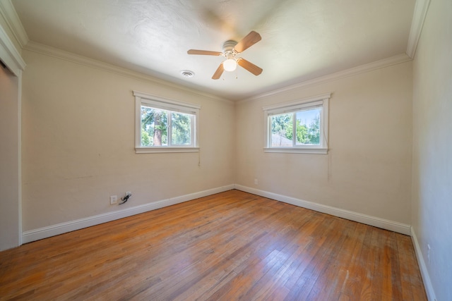 5101 Bidwell Rd, Redding, CA 96001 - spare room featuring plenty of natural light, hardwood / wood-style floors, baseboards, ceiling fan, and crown molding