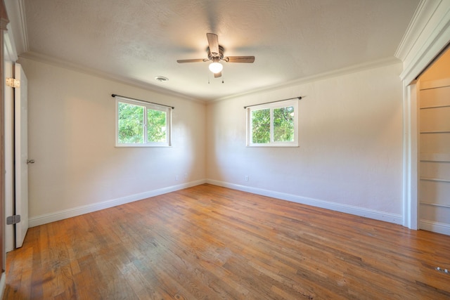 5101 Bidwell Rd, Redding, CA 96001 - unfurnished room with ornamental molding, ceiling fan, plenty of natural light, hardwood / wood-style floors, and baseboards