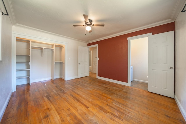 5101 Bidwell Rd, Redding, CA 96001 - unfurnished bedroom featuring a closet, wood finished floors, ornamental molding, baseboards, and a ceiling fan