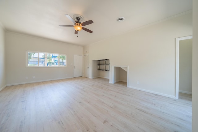 5101 Bidwell Rd, Redding, CA 96001 - unfurnished living room featuring ceiling fan, light wood-style floors, crown molding, and baseboards