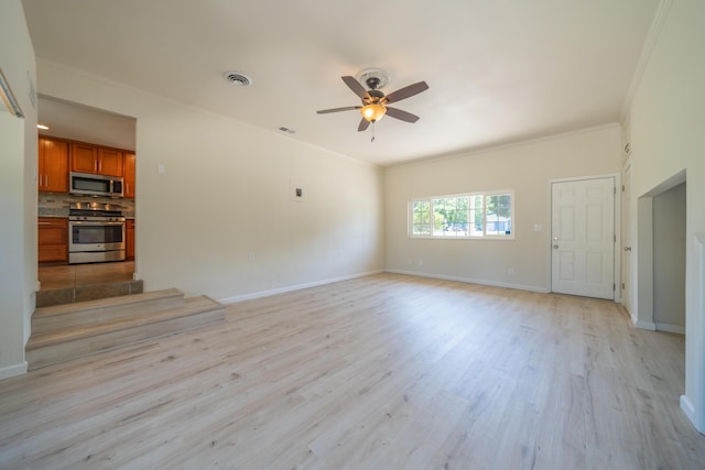 5101 Bidwell Rd, Redding, CA 96001 - unfurnished living room with light wood-type flooring, ceiling fan, crown molding, and baseboards