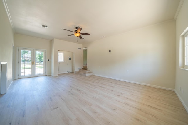 5101 Bidwell Rd, Redding, CA 96001 - unfurnished living room featuring light wood finished floors, a ceiling fan, baseboards, and crown molding