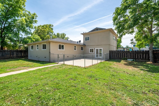 5101 Bidwell Rd, Redding, CA 96001 - back of property featuring stucco siding and a patio area