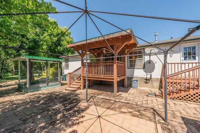 31 Rocky Rd, Weaverville, CA 96093 - rear view of house with a wooden deck, a ceiling fan, a patio area, and stairway