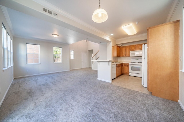 2340 Shining Star Way, Redding, CA 96003 - kitchen with white appliances, light carpet, open floor plan, ornamental molding, and a peninsula