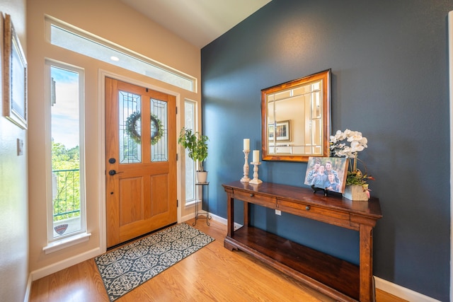 1030 Tulare Ct, Redding, CA 96003 - entryway featuring light wood-style floors, plenty of natural light, and baseboards