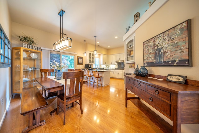 1030 Tulare Ct, Redding, CA 96003 - dining space with light wood-style flooring and recessed lighting