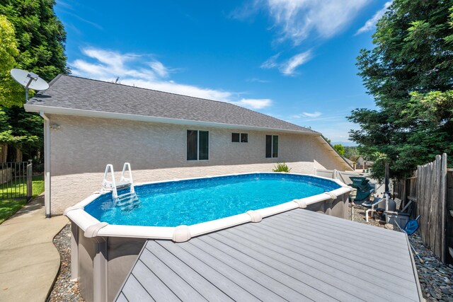 1030 Tulare Ct, Redding, CA 96003 - view of pool with a wooden deck