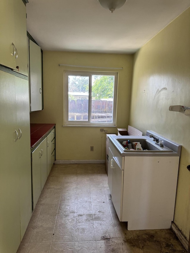 2392 Balls Ferry Rd, Anderson, CA 96007 - kitchen featuring a sink and baseboards