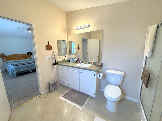 29093 Day Rd, Mcarthur, CA 96056 - ensuite bathroom with vanity, ceiling fan, toilet, and baseboards