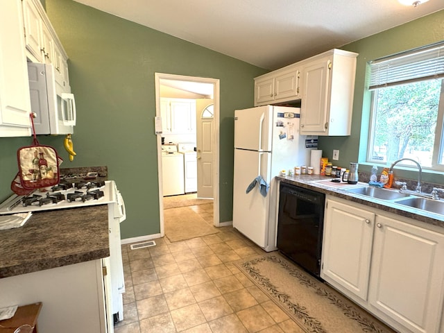 29093 Day Rd, Mcarthur, CA 96056 - kitchen featuring white appliances, a sink, vaulted ceiling, white cabinets, and dark countertops
