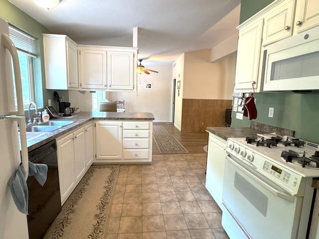 29093 Day Rd, Mcarthur, CA 96056 - kitchen featuring white appliances, ceiling fan, a peninsula, a sink, and white cabinets