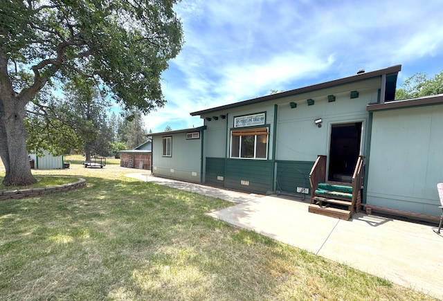 29093 Day Rd, Mcarthur, CA 96056 - back of house featuring entry steps, a lawn, crawl space, and a patio area