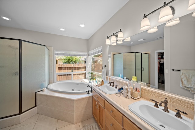 3921 Silver Lace Ln, Redding, CA 96001 - full bath featuring a shower stall, double vanity, tile patterned flooring, a tub with jets, and a spacious closet