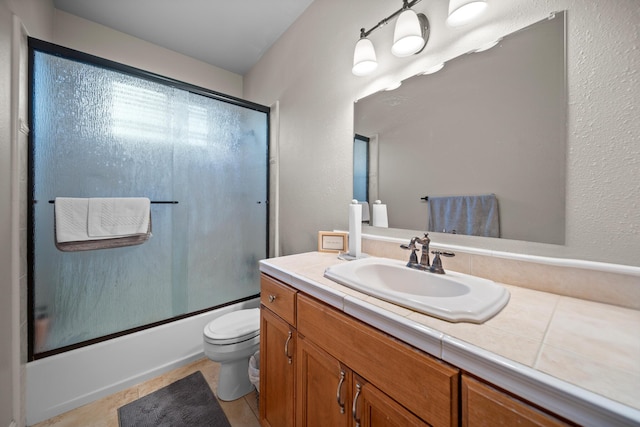 3921 Silver Lace Ln, Redding, CA 96001 - full bath with vanity, combined bath / shower with glass door, and tile patterned floors