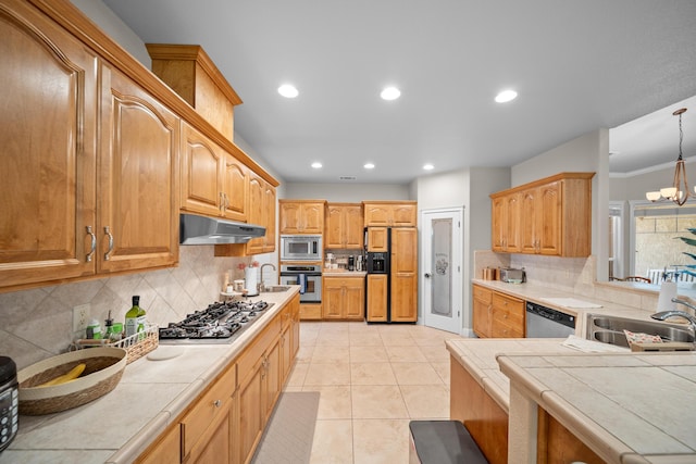 3921 Silver Lace Ln, Redding, CA 96001 - kitchen featuring built in appliances, under cabinet range hood, tile counters, decorative backsplash, and recessed lighting