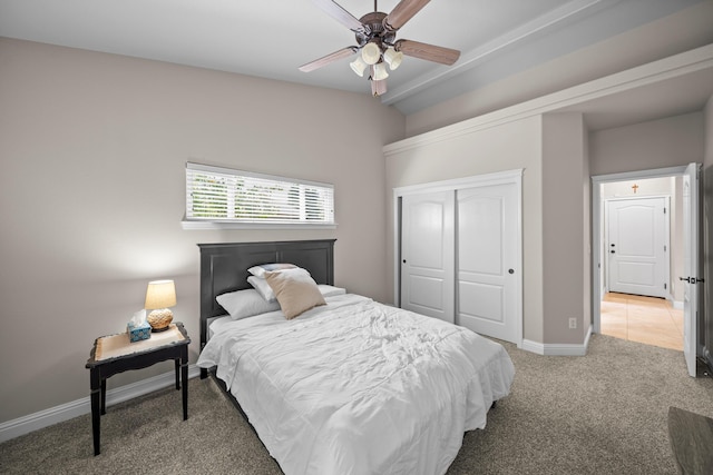 3921 Silver Lace Ln, Redding, CA 96001 - bedroom with light colored carpet, a closet, and ceiling fan