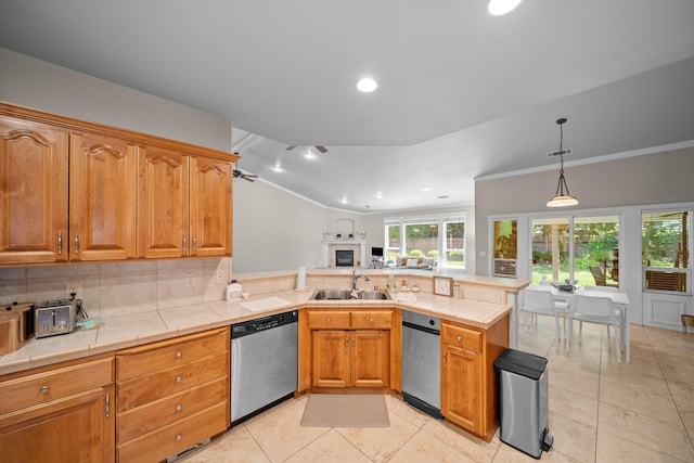 3921 Silver Lace Ln, Redding, CA 96001 - kitchen featuring dishwasher, a peninsula, light tile patterned floors, tile counters, and decorative light fixtures