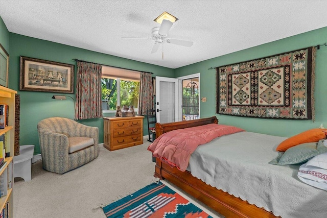 3141 Meadow Oak Dr, Cottonwood, CA 96022 - bedroom featuring carpet, a textured ceiling, and a ceiling fan