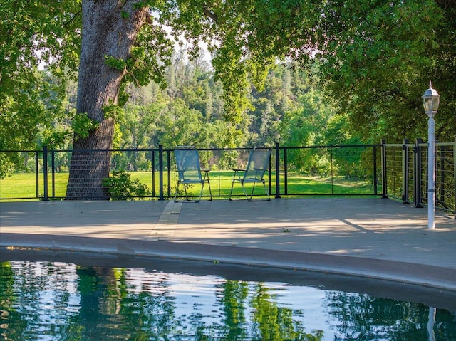 3141 Meadow Oak Dr, Cottonwood, CA 96022 - view of swimming pool with a deck
