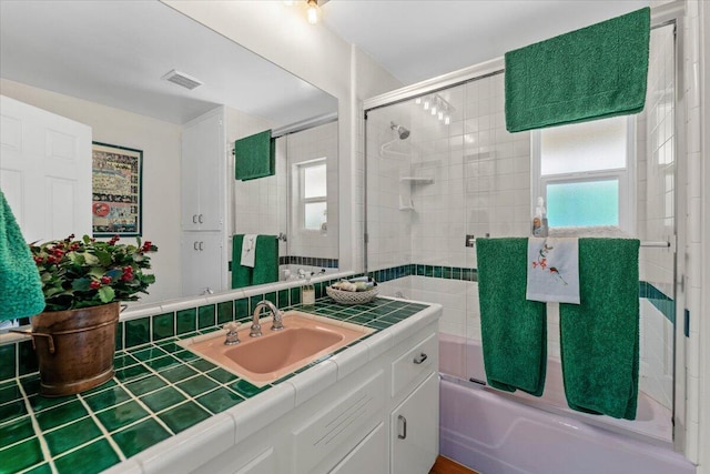 3141 Meadow Oak Dr, Cottonwood, CA 96022 - bathroom featuring vanity, plenty of natural light, and combined bath / shower with glass door