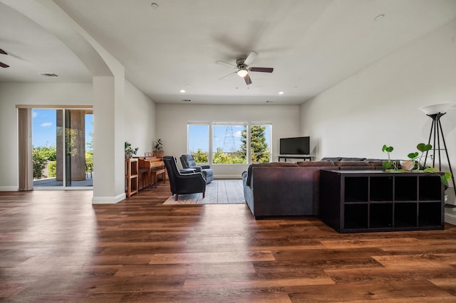 1005 Albion Ave, Redding, CA 96003 - living room featuring a ceiling fan, wood finished floors, baseboards, arched walkways, and recessed lighting