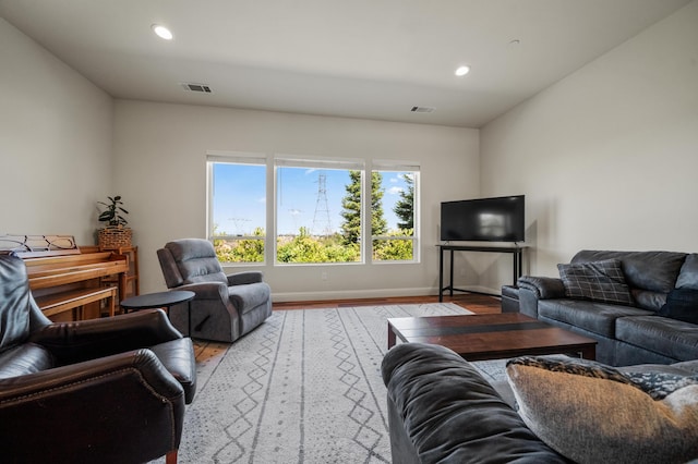 1005 Albion Ave, Redding, CA 96003 - living area featuring wood finished floors, baseboards, and recessed lighting