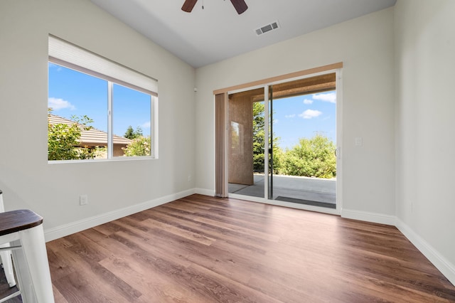 1005 Albion Ave, Redding, CA 96003 - unfurnished room with a ceiling fan, baseboards, and wood finished floors