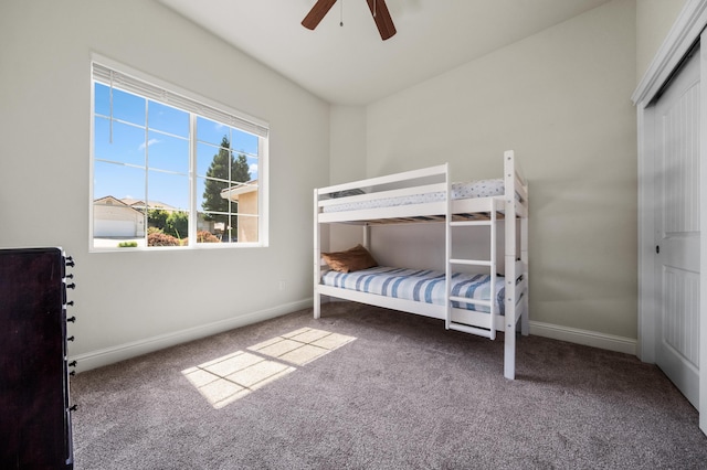 1005 Albion Ave, Redding, CA 96003 - bedroom featuring carpet flooring, baseboards, a ceiling fan, and a closet