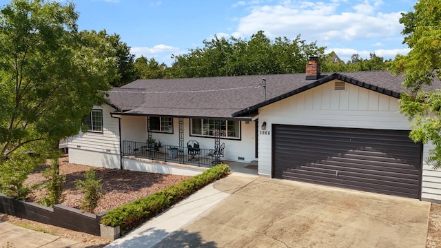 1666 Willis St, Redding, CA 96001 - single story home featuring a porch, concrete driveway, a garage, a chimney, and roof with shingles
