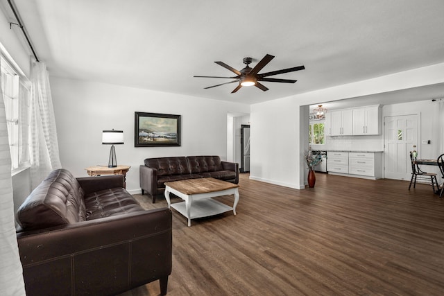 1666 Willis St, Redding, CA 96001 - living area with a ceiling fan and dark wood finished floors